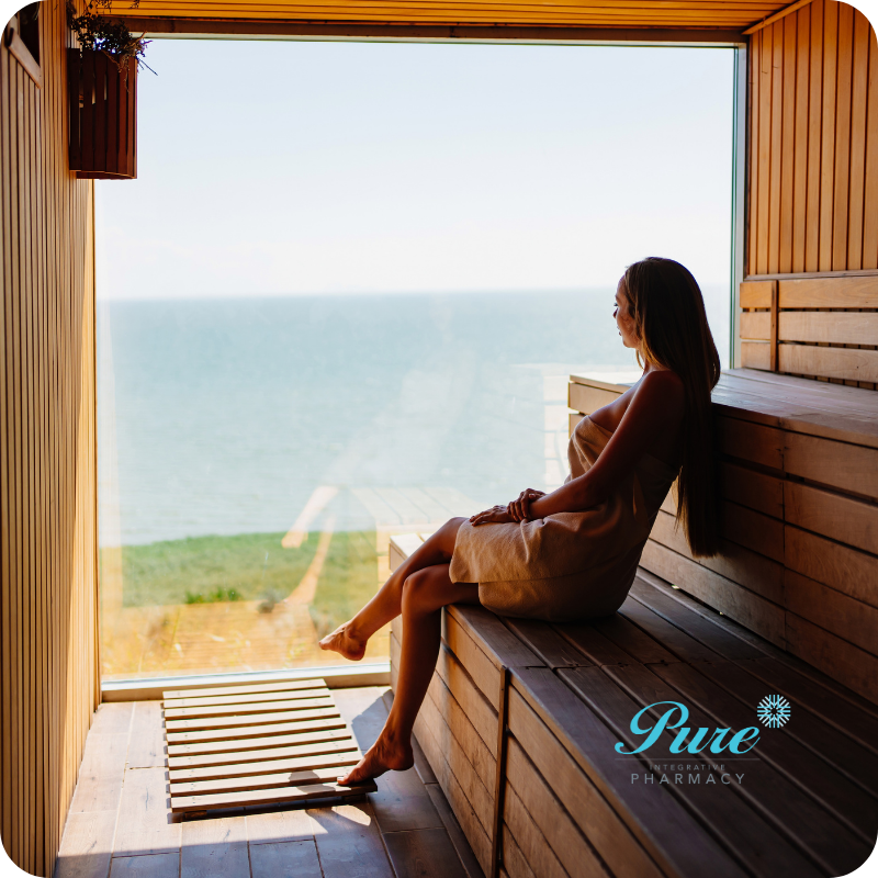 woman sits in warm sauna